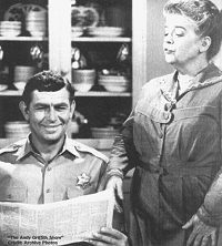 Andy reading the paper with Aunt Bee